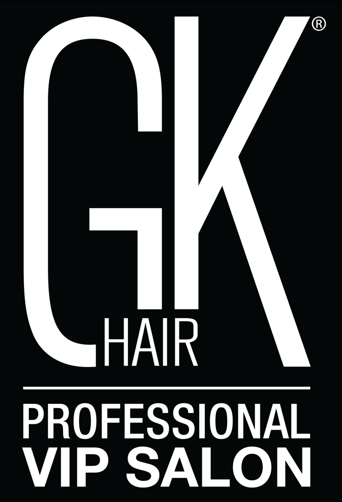 GK Hair PROFESSIONAL VIP Salon sign: white GK HAIR logo and PROFESSIONAL VIP SALON wordmark on a black rectangular panel