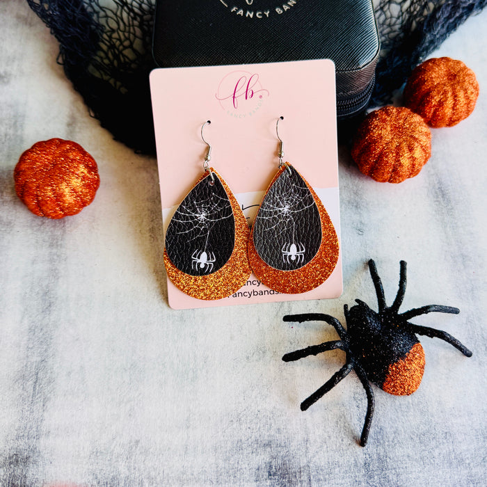Orange Webbed Sparkle Double Layer Faux Leather Drop Ear Bling — Introducing our double-layer tear drop faux leather earrings, where sophistication meets creativity.