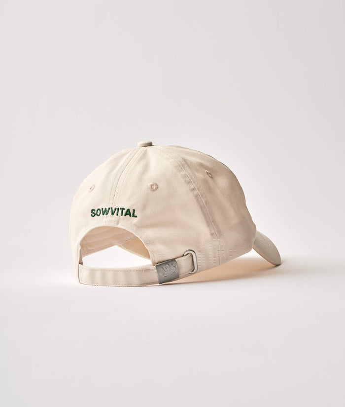 Beige cap with "Sowvital" embroidered on the back in green on a white background