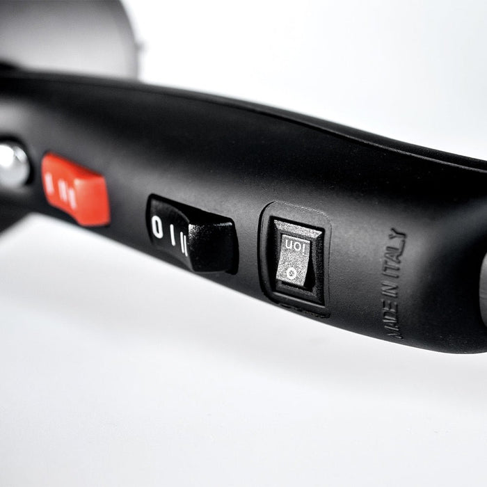Close-up of heat and speed and ion controls on the Sam Villa Artist Series Professional Hair Dryer.