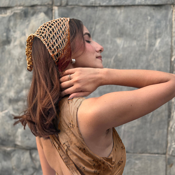 Lightweight crochet headscarf styled as bandana, hair wrap, or headwrap - dull gold tone