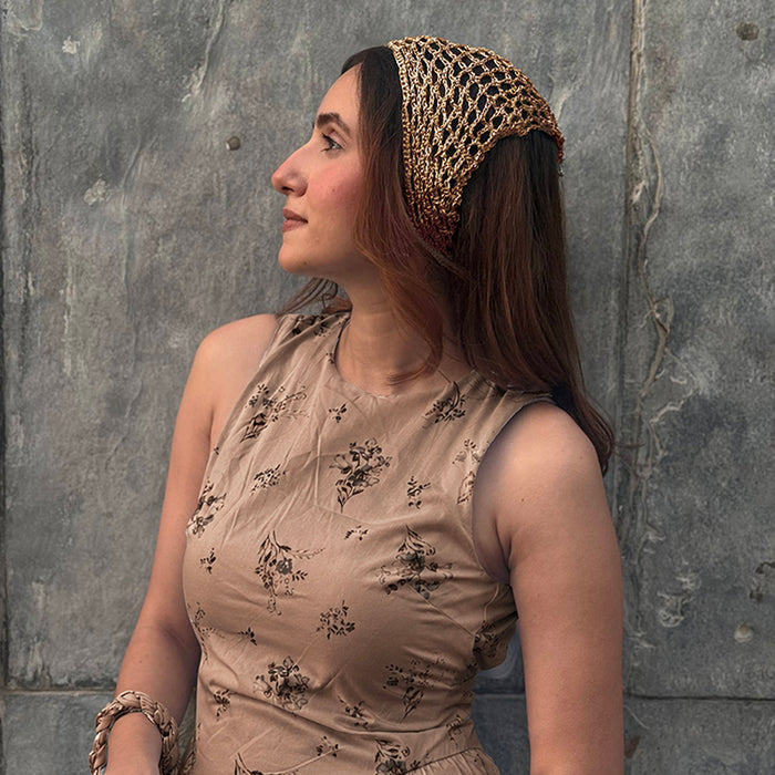 Festival-ready crochet headscarf in muted gold - perfect for concerts and summer outings