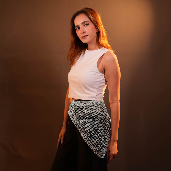 Versatile off-white crochet scarf with celestial accents for chic summer styling moments.