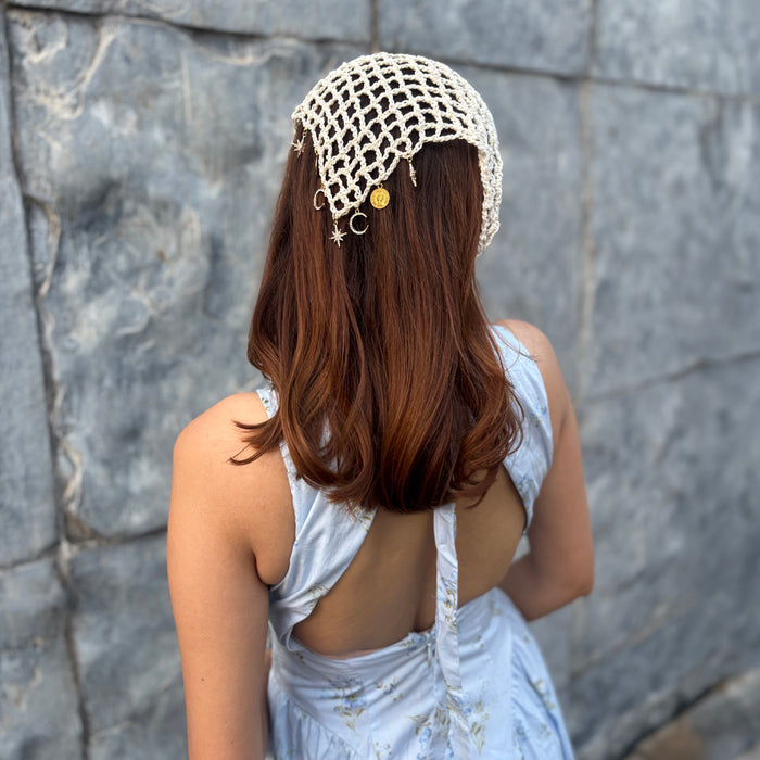 Off white crochet headscarf with gold star and moon charms, ties as bandana or hair wrap