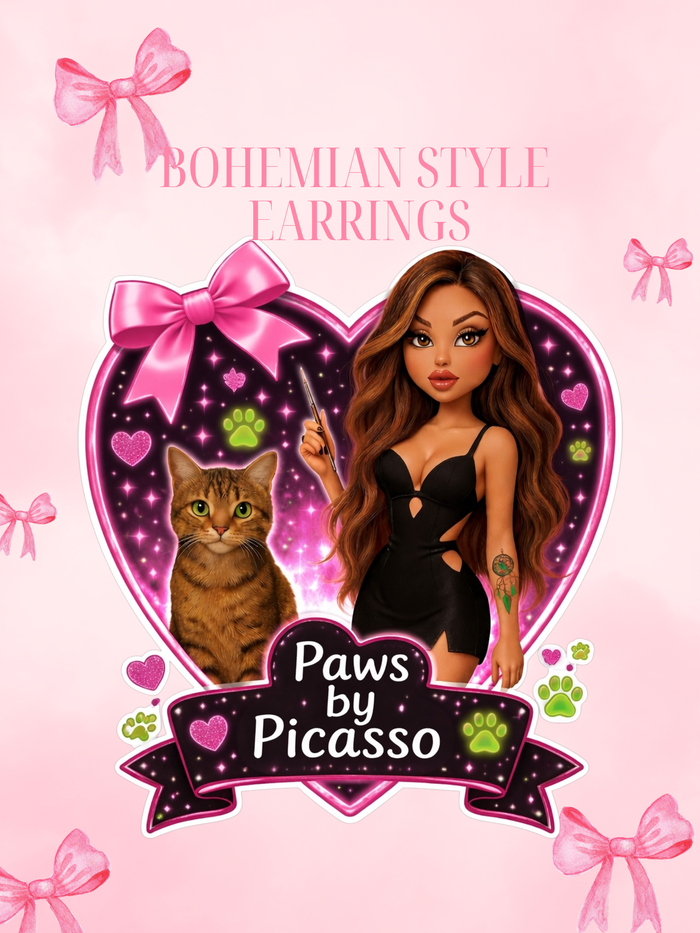 Product card for 'Paws by Picasso' jewelry with a doll and cat illustration on a pink background.