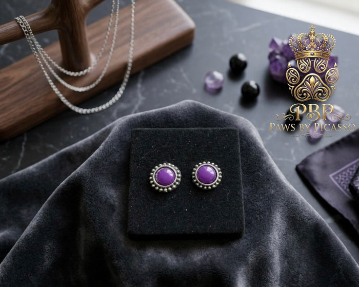 Purple earrings on a black display box with 'Paws by Picasso' logo in the corner.