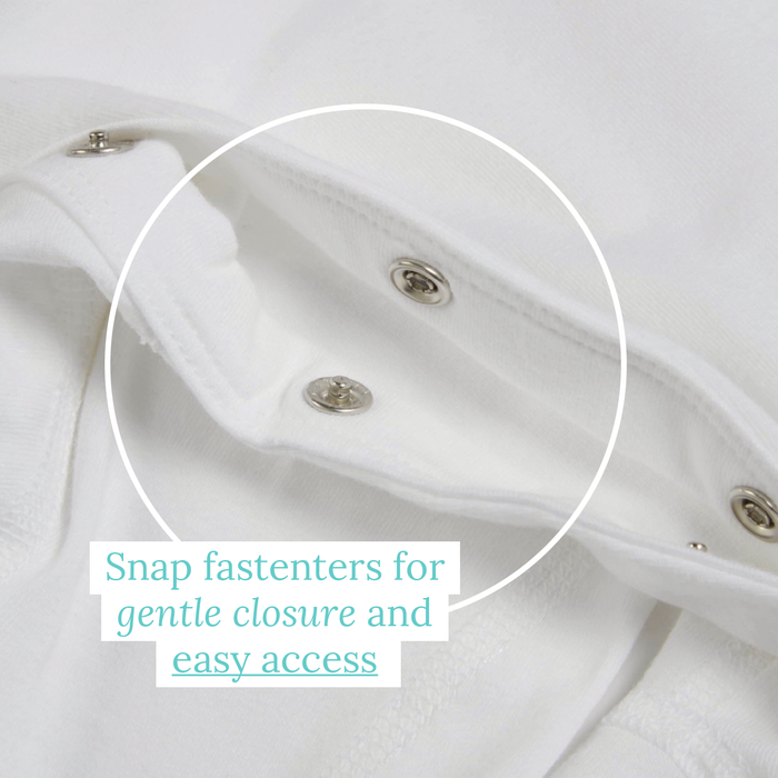 Foldaway mitt fasteners on a Dreamskin eczema baby bodysuit