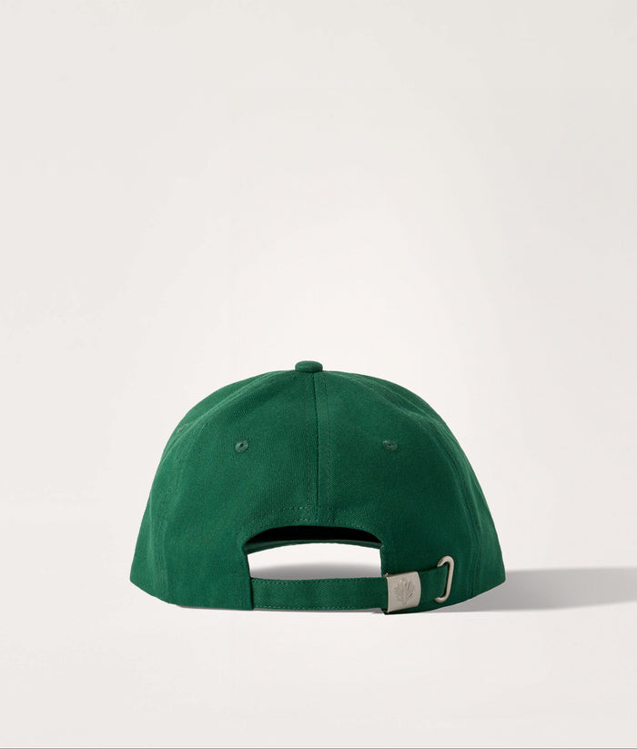 Green cap on a light gray background.
