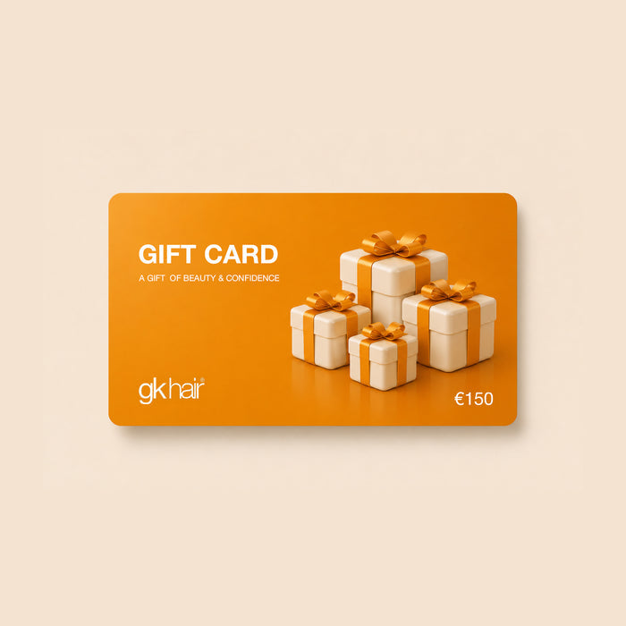 GK Hair €150 gift card, orange with the line a gift of beauty & confidence and four cream gift boxes with orange bows