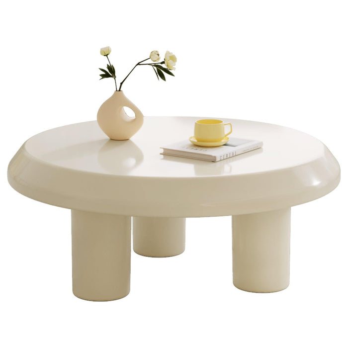Family-friendly coffee table with rounded edges and sturdy tri-legged support.