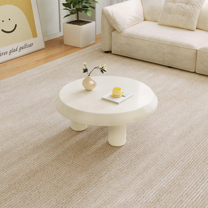 Stylish tri-leg coffee table with rounded edges for family-friendly homes.