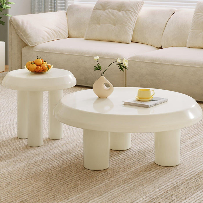 Nesting coffee table set with one large and one small table in a round, elegant design.