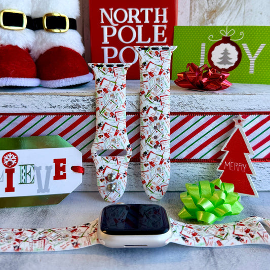 Close-up of Letters to Santa Christmas envelope print pattern on Apple Watch silicone band showing candy canes and stamps