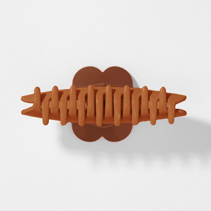 Stylish heart claw hair clip in earthy brown shades for easy and secure hair styling
