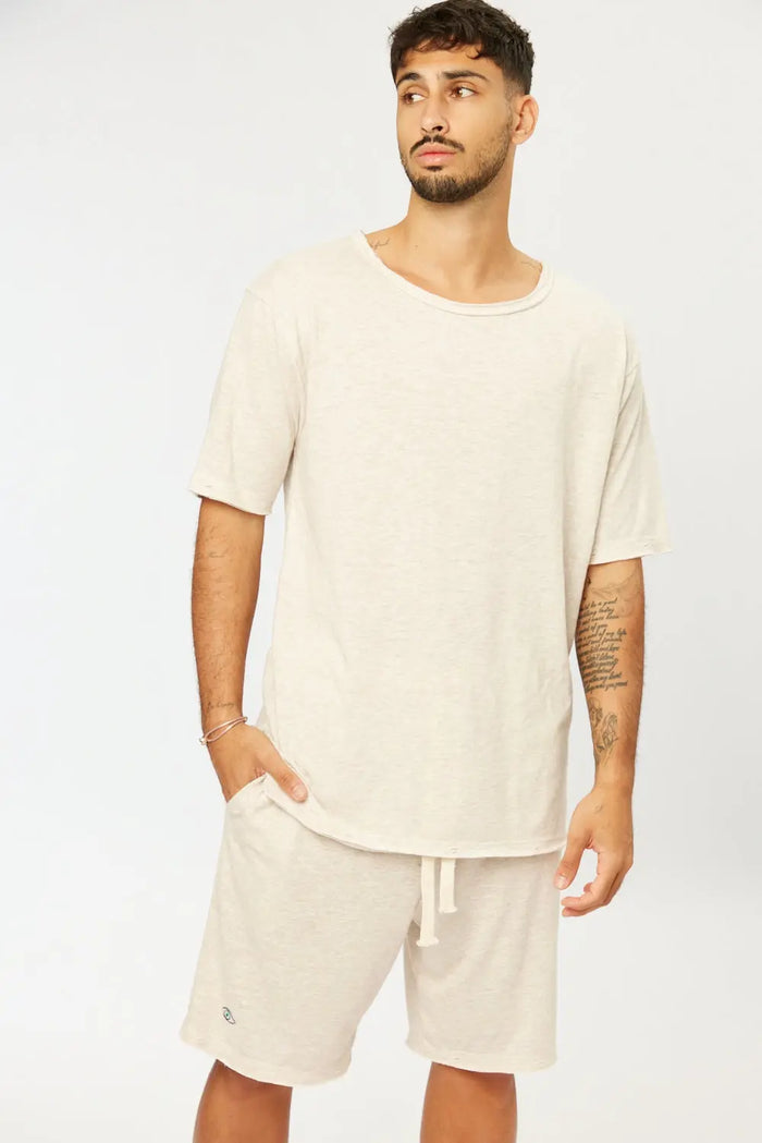 Man wearing Nicki Soft Open Top in melange stone with matching shorts
