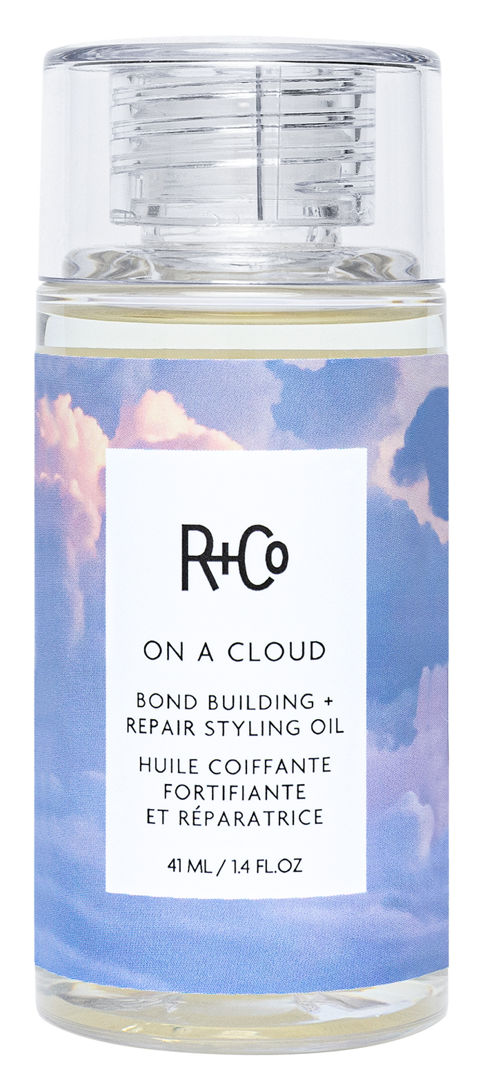 R+Co styling oil bottle with cloud design on label
