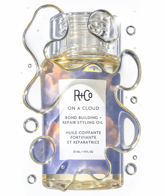 R+Co On a Cloud styling oil bottle with label on a white background