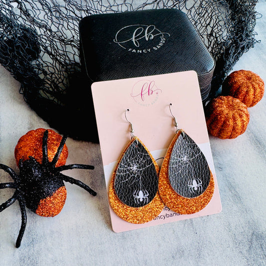 Orange Webbed Sparkle Double Layer Faux Leather Drop Ear Bling — Introducing our double-layer tear drop faux leather earrings, where sophistication meets creativity.