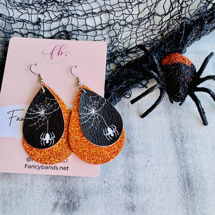 Orange Webbed Sparkle Double Layer Faux Leather Drop Ear Bling — Introducing our double-layer tear drop faux leather earrings, where sophistication meets creativity.