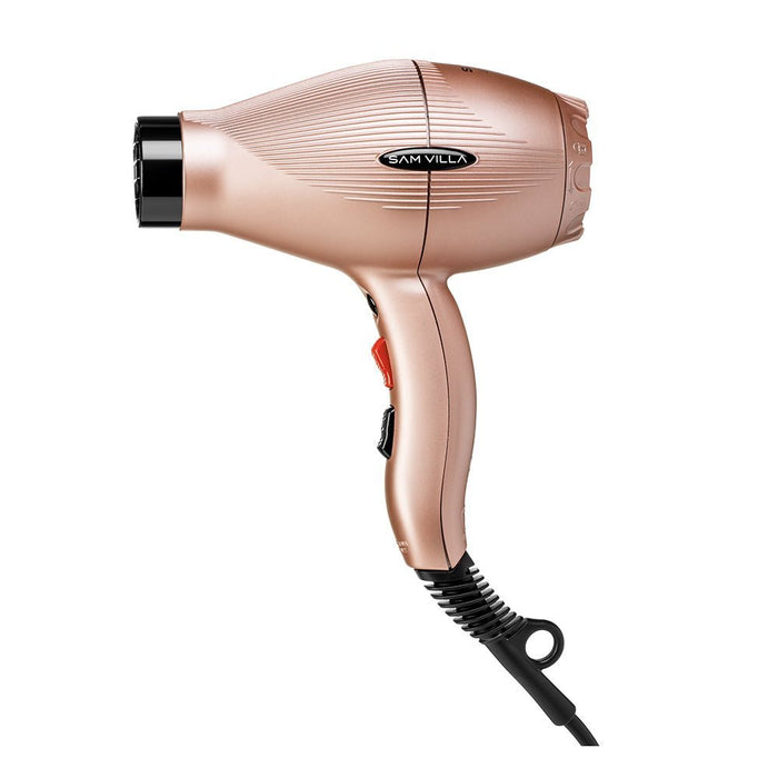 Side profile of the Sam Villa Pro Light Ionic Hair Dryer in Rose Gold showing ergonomic handle and balanced design.