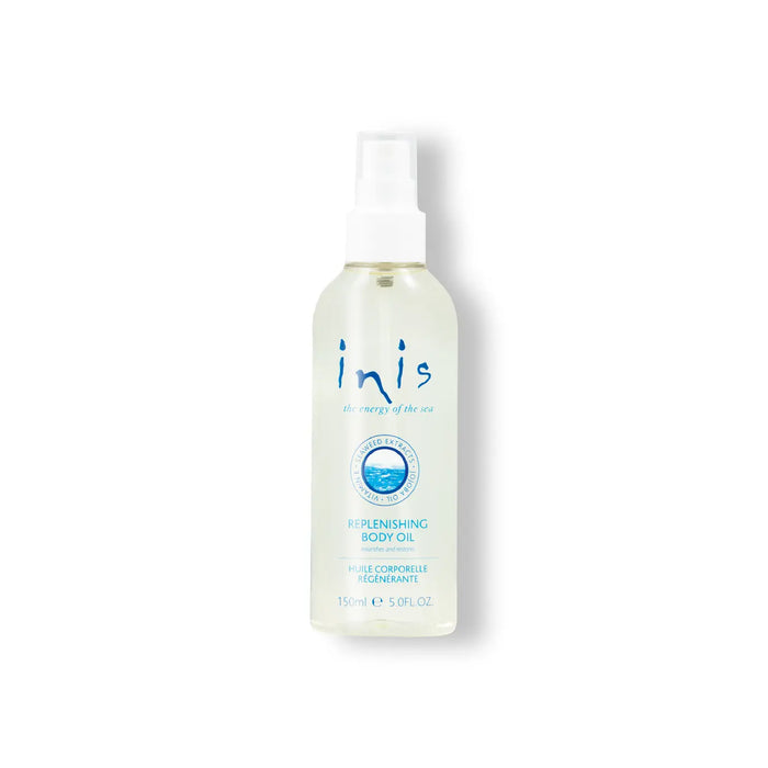Bottle of Inis body oil on a white background