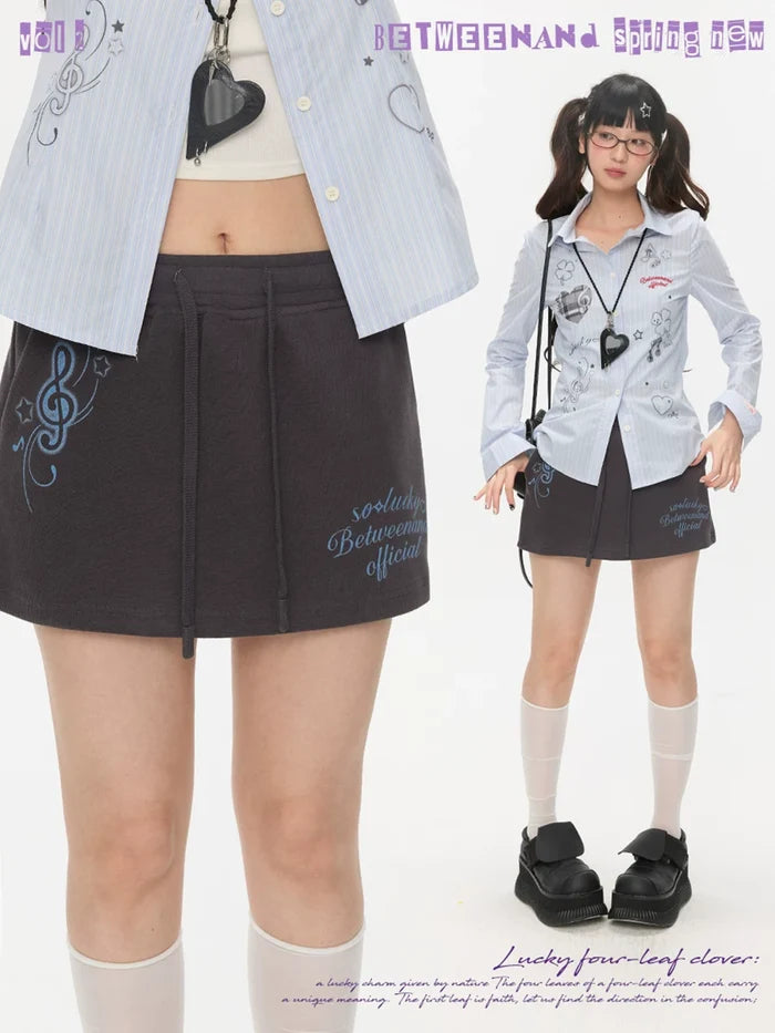 Small note printed skirt