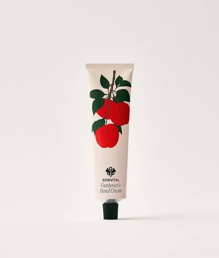 Apple Orchard Hand Cream 75ml. Hand cream tube with apple design on a white background