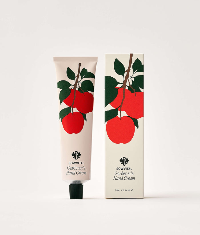 Apple Orchard Hand Cream 75ml. Hand cream with packaging featuring red apples on a white background