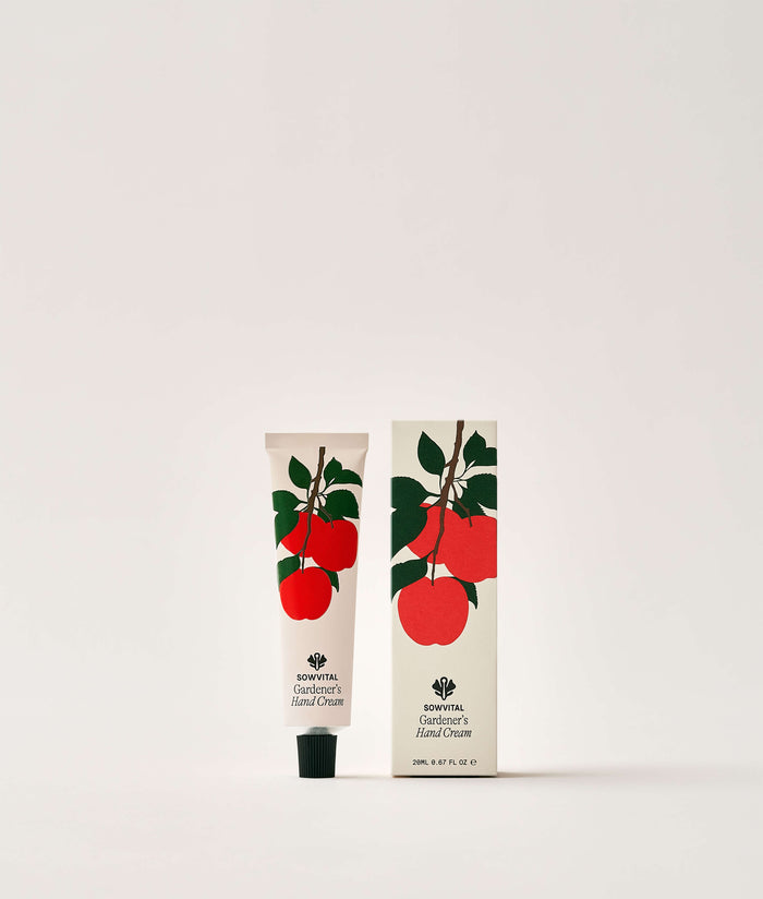 Apple Orchard Hand Cream 20ml. Hand cream tube and packaging with apple design on a white background