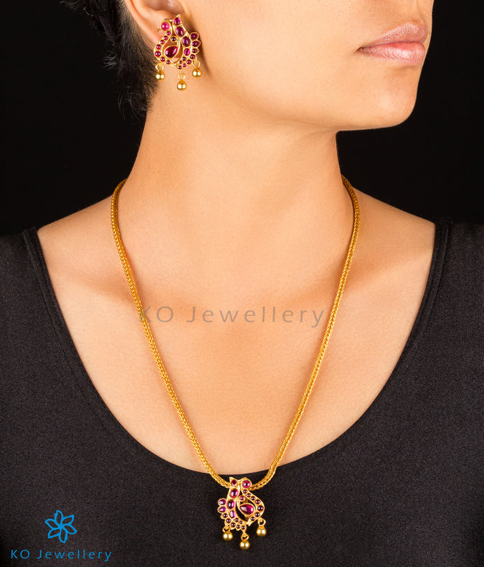 The Lasaka Silver Peacock Kempu Pendant Set