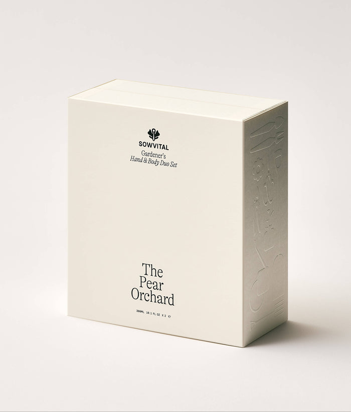 White box with 'The Pear Orchard' branding on a light gray background