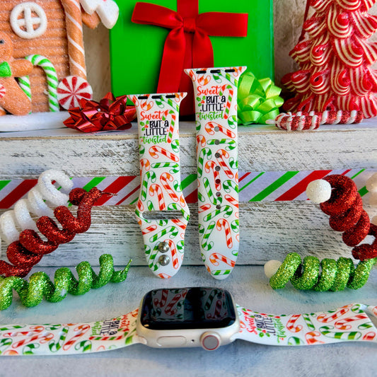 Close up of Twistmas Vibes silicone Apple Watch strap showing candy cane pattern