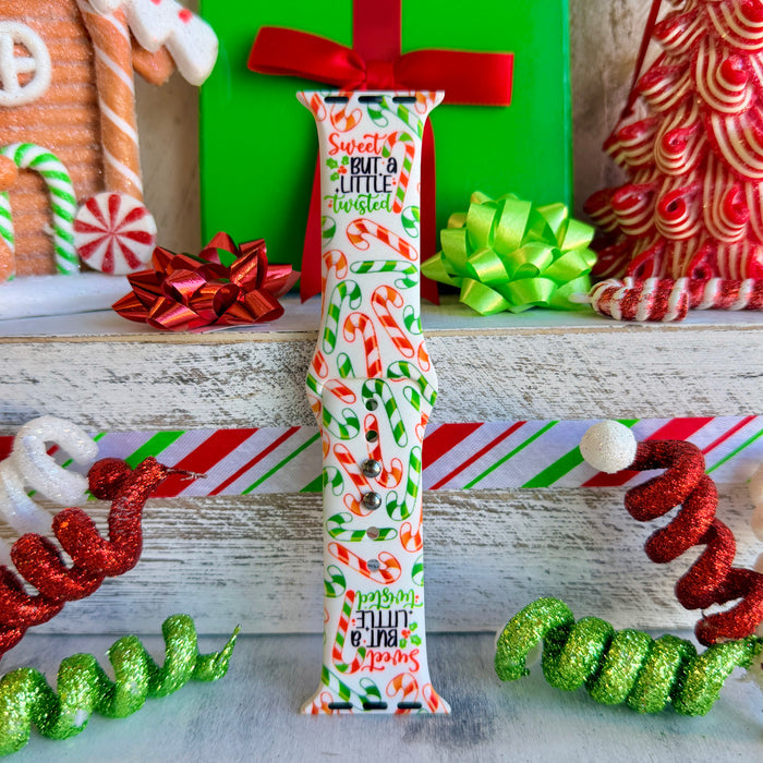 Close up of Twistmas Vibes silicone Apple Watch strap showing candy cane pattern