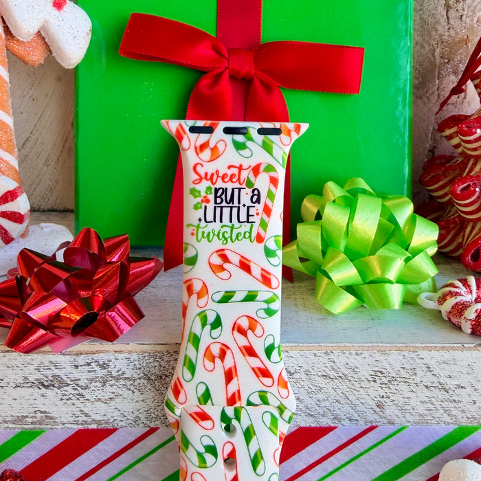 Close up of Twistmas Vibes silicone Apple Watch strap showing candy cane pattern