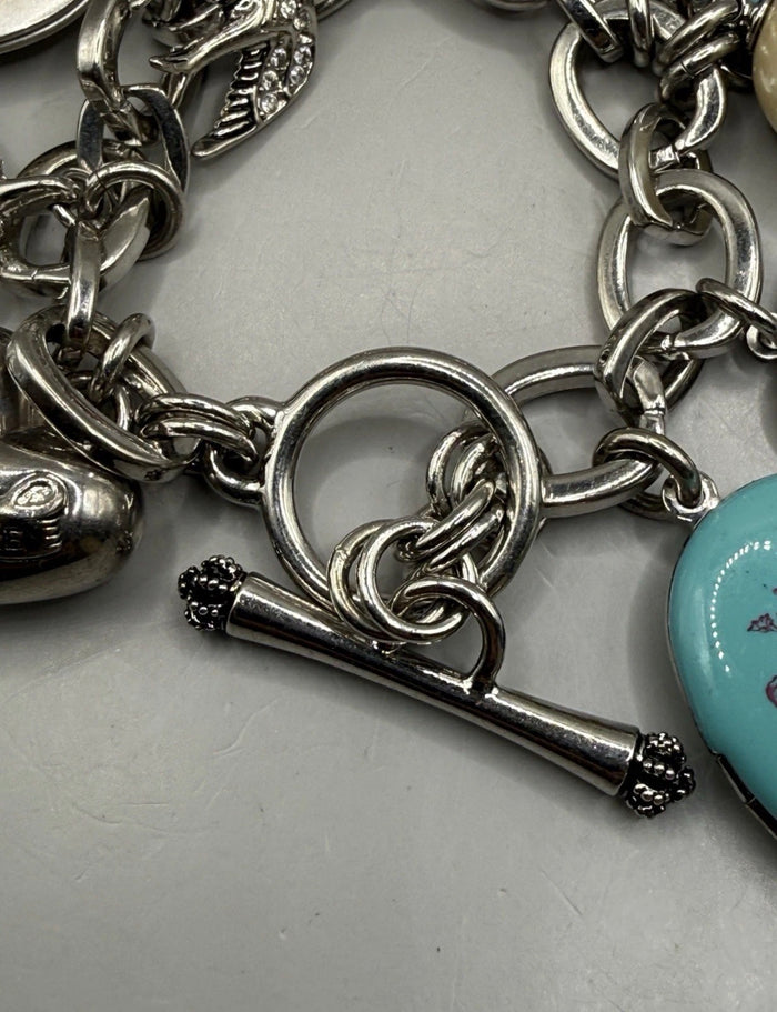 Vintage Juicy Couture silver-tone chunky charm bracelet with strawberry locket, horseshoe, pearl, heart, crystal and turquoise charms