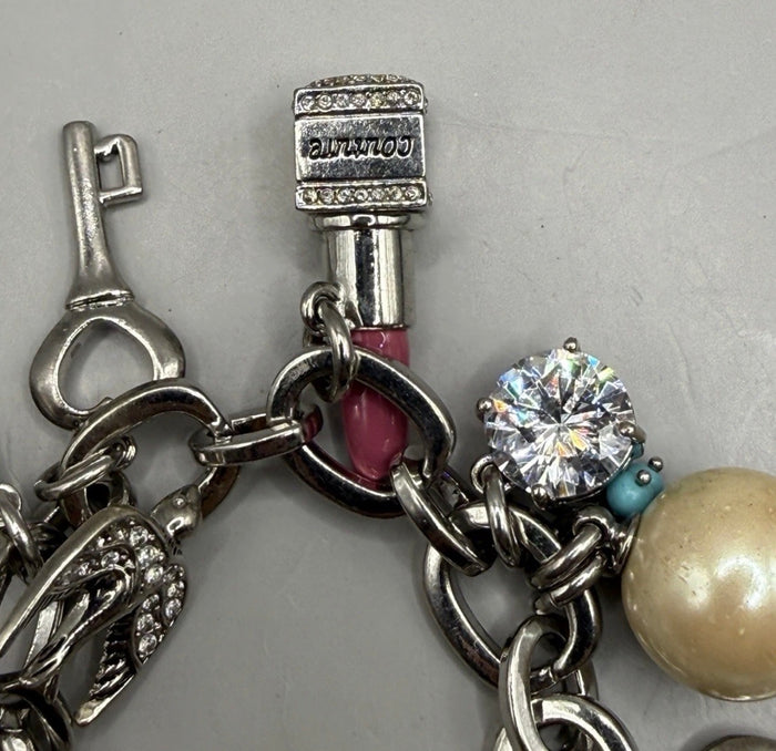 Vintage Juicy Couture silver-tone chunky charm bracelet with strawberry locket, horseshoe, pearl, heart, crystal and turquoise charms